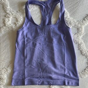 Lululemon size 4 purple cropped swiftly tech